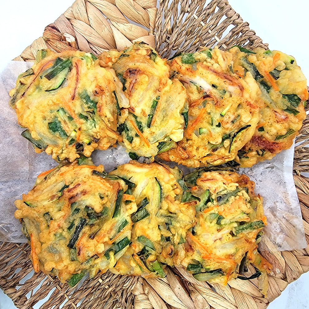 Close-up view of Ojingeo buchu-jeon batter (Korean squid chive pancake mix) | Banchan365