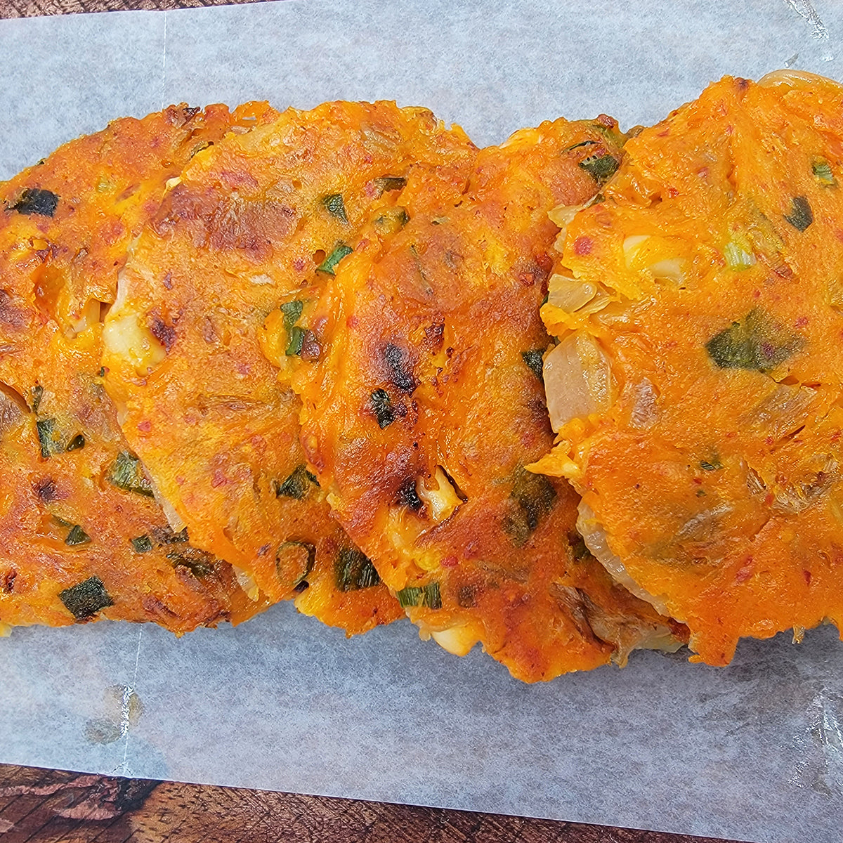 Close-up view of Ojingeo kimchi-jeon batter (Korean squid kimchi pancake mix) | Banchan365