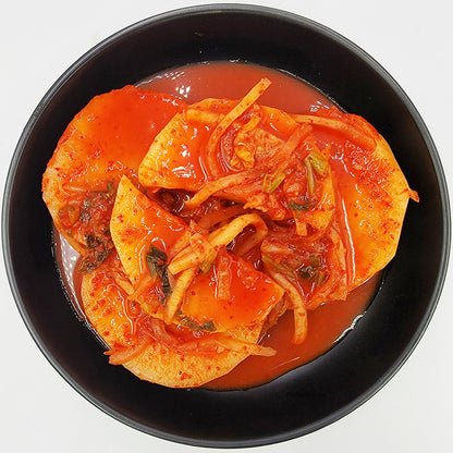 Jeju seokbakji (Korean sliced radish kimchi, Jeju style) served and plated | Banchan365